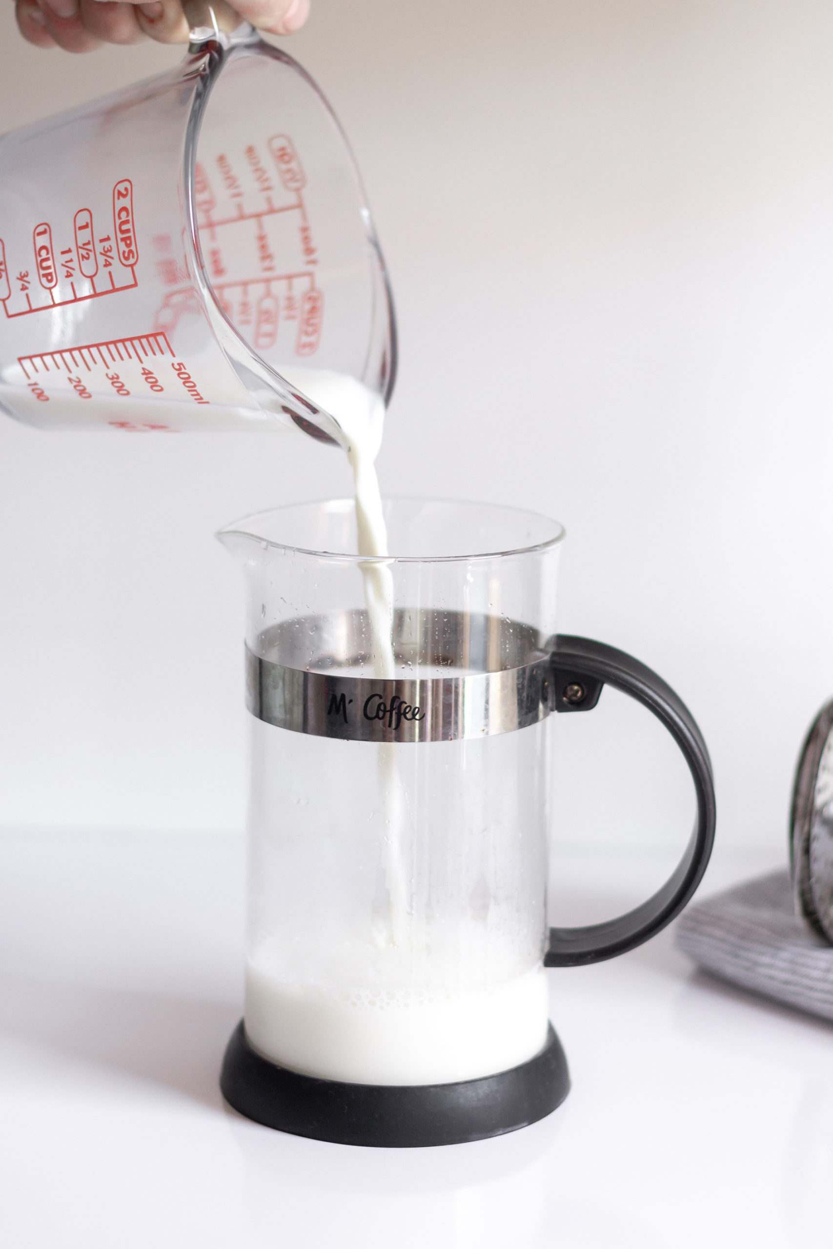 How to Froth Milk at Home using a French Press - Yes Moore Tea